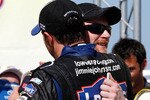 TALLADEGA, AL - APRIL 17:  Jimmie Johnson (FRONT), driver of the #48 Lowe's Chevrolet, hugs teammates Dale Earnhardt Jr. (BACK), driver of the #88 National Guard/Amp Energy Chevrolet, in Victory Lane after winning the NASCAR Sprint Cup Series Aaron's 499 at Talladega Superspeedway on April 17, 2011 in Talladega, Alabama.  (Photo by Chris Graythen/Getty Images)