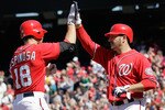 WASHINGTON, DC - APRIL 17:  Danny Espinosa #18 of the Washington Nationals celebrates with pitcher Jason Marquis #21 after Espinosa hit a three run home run during the fifth inning against the Milwaukee Brewers during the first game of a doubleheader at Nationals Park on April 17, 2011 in Washington, DC.  (Photo by Rob Carr/Getty Images)