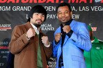NEW YORK, NY - FEBRUARY 14:  Manny Pacquiao (L) and Shane Mosley pose for photographs to promote their upcoming fight at The Lighthouse at Chelsea Piers on February 14, 2011 in New York City.  (Photo by Chris Trotman/Getty Images)