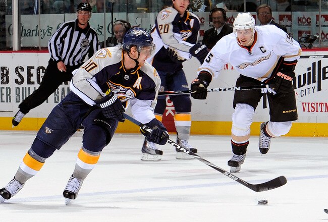NASHVILLE, TN - MARCH 24:   Martin Erat #10 of the Nashville Predators skates against Ryan Getzlaf #15 of the Anaheim Ducks on March 24, 2011 at the Bridgestone Arena in Nashville, Tennessee.  (Photo by Frederick Breedon/Getty Images)