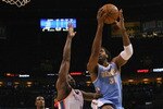 OKLAHOMA CITY, OK - APRIL 17: Nene #31 of the Denver Nuggets drives to the basket against Kendrick Perkins #5 of the Oklahoma City Thunder in Game One of the Western Conference Quarterfinals in the 2011 NBA Playoffs on April 17, 2011 at the Ford Center in Oklahoma City, Oklahoma. NOTE TO USER: User expressly acknowledges and agrees that, by downloading and or using this photograph, User is consenting to the terms and conditions of the Getty Images License Agreement. (Photo by Dilip Vishwanat/Getty Images)