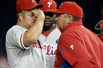 WASHINGTON, DC - APRIL 12:  Starting pitcher Joe Blanton #56 of the Philadelphia Phillies (L) talks with pitching coach Rich Dubee (R) during the fourth inning against the Washington Nationals at Nationals Park on April 12, 2011 in Washington, DC.  (Photo by Rob Carr/Getty Images)