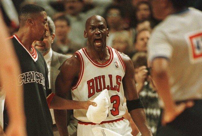 20 Apr 1996:  As teammate Scottie Pippen holds him back, guard Michael Jordan of the Chicago Bulls has words for referee Hugh Hollins, foreground, who called a foul on Jordan with .05 seconds to go in the game allowing Indiana Pacer Eddie Johnson to makea free throw to beat the Bulls 100-99 at the United Center in Chicago, Illinois. The loss, the Bulls'' second home loss of the season brings their overall record to 71-10. Mandatory Credit: Jonathan Daniel/Allsport