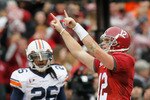 TUSCALOOSA, AL - NOVEMBER 26:  Quarterback Greg McElroy #12 of the Alabama Crimson Tide reacts a throwing for a touchdown against the Auburn Tigers at Bryant-Denny Stadium on November 26, 2010 in Tuscaloosa, Alabama.  (Photo by Kevin C. Cox/Getty Images)