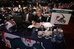 NEW YORK - APRIL 26:  Representatives of the Miami Dolphins work during the 2008 NFL Draft on April 26, 2008 at Radio City Music Hall in April 26, 2008 in New York City.  (Photo by Jim McIsaac/Getty Images)