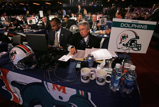 NEW YORK - APRIL 26:  Representatives of the Miami Dolphins work during the 2008 NFL Draft on April 26, 2008 at Radio City Music Hall in April 26, 2008 in New York City.  (Photo by Jim McIsaac/Getty Images)