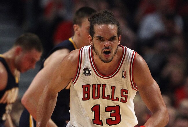 CHICAGO, IL - APRIL 18: Joakim Noah #13 of the Chicago Bulls runs up the court after a dunk against the Indiana Pacers in Game Two of the Eastern Conference Quarterfinals in the 2011 NBA Playoffs at the United Center on April 18, 2011 in Chicago, Illinois. The Bulls defeated the Pacers 96-90. NOTE TO USER: User expressly acknowledges and agrees that, by downloading and/or using this photograph, User is consenting to the terms and conditions of the Getty Images License Agreement. (Photo by Jonathan Daniel/Getty Images)