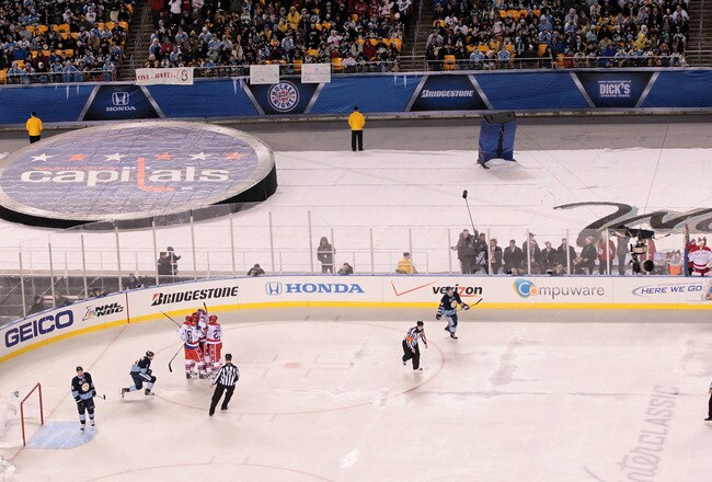 PITTSBURGH, PA - JANUARY 01:  The Washington Capitals celebrate scoring a goal against the Pittsburg Penguins during the second period of the 2011 NHL Bridgestone Winter Classic at Heinz Field on January 1, 2011 in Pittsburgh, Pennsylvania. Washington won 3-1.  (Photo by Jamie Squire/Getty Images)