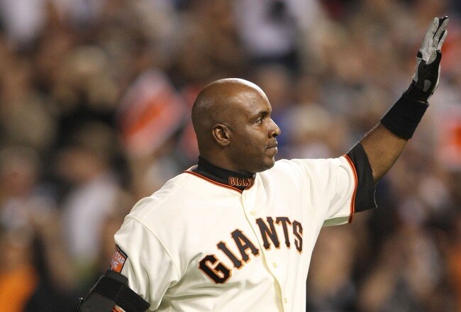 SAN FRANCISCO - SEPTEMBER 26:  Barry Bonds #25 of the San Francisco Giants waves to fans as he leaves the game against the San Diego Padres at the end of the sixth inning on September 26, 2007 at AT&T Park in San Francisco, California. Tonight will be the final home game for Bonds as a member of the San Francisco Giants.  (Photo by Jed Jacobsohn/Getty Images)