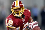ARLINGTON, TX - NOVEMBER 22:  Wide receiver Malcolm Kelly #12 of the Washington Redskins at Cowboys Stadium on November 22, 2009 in Arlington, Texas.  (Photo by Ronald Martinez/Getty Images)