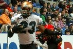 UNIONDALE, NY - APRIL 28: Trandon Harvey #23 of the Arizona Rattlers runs the ball in for a touchdown against Ifeanyi Ohalete #2 of the New York Dragons on April 28, 2007 at the Nassau Coliseum in Uniondale, New York. (Photo by Mike Stobe/Getty Images)