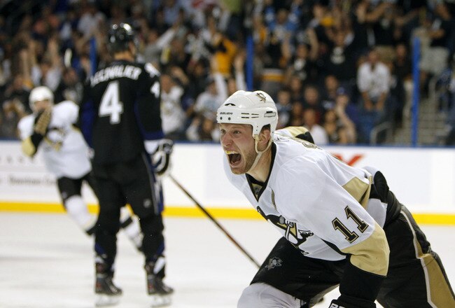 TAMPA, FL - APRIL 20: Jordan Staal #11 of the Pittsburgh Penguins reacts to a goal scored for the win by teammate James Neal #18 in the second overtime period against the Tampa Bay Lightning in Game Four of the Eastern Conference Quarterfinals during the 2011 NHL Stanley Cup Playoffs at the St. Pete Times Forum on April 20, 2011 in Tampa, Florida. (Photo by Eliot J. Schechter/Getty Images)
