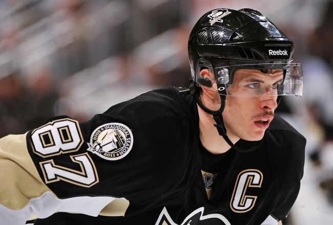 PITTSBURGH, PA - DECEMBER 20:  Sidney Crosby #87 of the Pittsburgh Penguins gets ready to take a face off against the Phoenix Coyotes on December 20, 2010 at CONSOL Energy Center in Pittsburgh, Pennsylvania.  (Photo by Jamie Sabau/Getty Images)