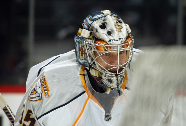 DENVER, CO - MARCH 31:  Goalie Pekka Rinne #35 of the Nashville Predators warms up prior to facing the Colorado Avalanche at the Pepsi Center on March 31, 2011 in Denver, Colorado. Rinne had 27 saves as the Nashville Predators defeated the Colorado Avalanche 3-2.  (Photo by Doug Pensinger/Getty Images)