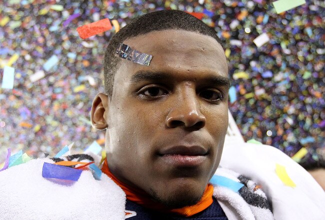 GLENDALE, AZ - JANUARY 10:  Quarterback Cameron Newton #2 of the Auburn Tigers celebrates the Tigers 22-19 victory against the Oregon Ducks in the Tostitos BCS National Championship Game at University of Phoenix Stadium on January 10, 2011 in Glendale, Arizona.  (Photo by Christian Petersen/Getty Images)