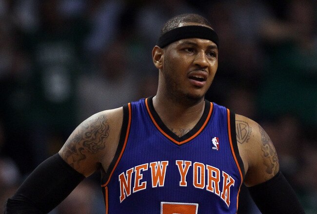 BOSTON, MA - APRIL 19:  Carmelo Anthony #7 of the New York Knicks reacts to a call in the second half against the Boston Celtics in Game Two of the Eastern Conference Quarterfinals in the 2011 NBA Playoffs on April 19, 2011 at the TD Garden in Boston, Massachusetts. The Boston Celtics defeated the New York Knicks 96-93. NOTE TO USER: User expressly acknowledges and agrees that, by downloading and or using this photograph, User is consenting to the terms and conditions of the Getty Images License Agreement.  (Photo by Elsa/Getty Images)