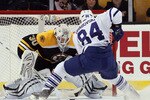 BOSTON, MA - MARCH 31:  Tim Thomas #30 of the Boston Bruins stops a penalty shot by Mikhail Grabovski #84 of the Toronto Maple Leafs on March 31, 2011 at the TD Garden in Boston, Massachusetts. The Toronto Maple Leafs defeated the Boston Bruins 4-3 in an overtime shootout.  (Photo by Elsa/Getty Images)
