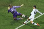 RUSTENBURG, SOUTH AFRICA - JUNE 26:  Richard Kingson of Ghana saves a shot from Benny Feilhaber of the United States during the 2010 FIFA World Cup South Africa Round of Sixteen match between USA and Ghana at Royal Bafokeng Stadium on June 26, 2010 in Rustenburg, South Africa.  (Photo by Martin Rose/Getty Images)