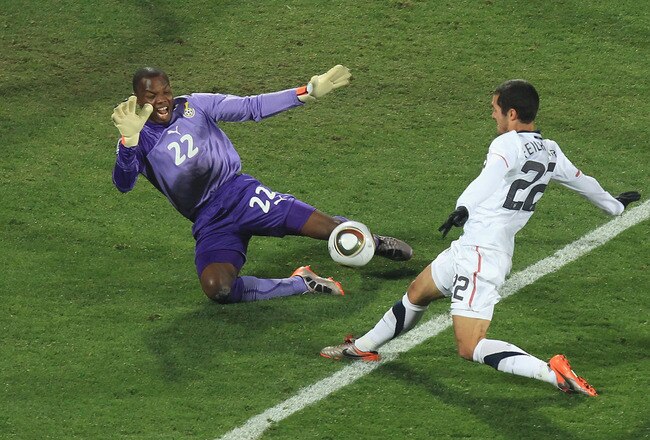 RUSTENBURG, SOUTH AFRICA - JUNE 26:  Richard Kingson of Ghana saves a shot from Benny Feilhaber of the United States during the 2010 FIFA World Cup South Africa Round of Sixteen match between USA and Ghana at Royal Bafokeng Stadium on June 26, 2010 in Rustenburg, South Africa.  (Photo by Martin Rose/Getty Images)