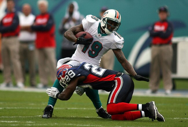 MIAMI - DECEMBER 19:  Receiver Brandon Marshall #19 of the Miami Dolphins makes a catch against the Buffalo Bills at Sun Life Stadium on December 19, 2010 in Miami, Florida. The Bills defeated the Dolphins 17-14.  (Photo by Marc Serota/Getty Images)