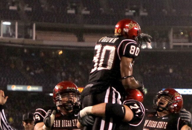 SAN DIEGO - NOVEMBER 20:  Wide receiver Vincent Brown #80 of the San Diego State Aztecs celebrates after his first touchdown of the game, on a ten yard reception in the first quarter against the Utah Utes at Qualcomm Stadium on November 20, 2010 in San Diego, California.  (Photo by Stephen Dunn/Getty Images)