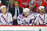 WASHINGTON, DC - APRIL 23:  Ruslan Fedotenko #19, Head Coach John Tortorella, Erik Christensen #26 and Vinny Prospal #20 of the New York Rangers appear dejected as they loose to the Washington Capitals 3-1 in Game Five of the Eastern Conference Quarterfinals during the 2011 NHL Stanley Cup Playoffs at the Verizon Center on April 23, 2011 in Washington, DC.  (Photo by Len Redkoles/Getty Images)