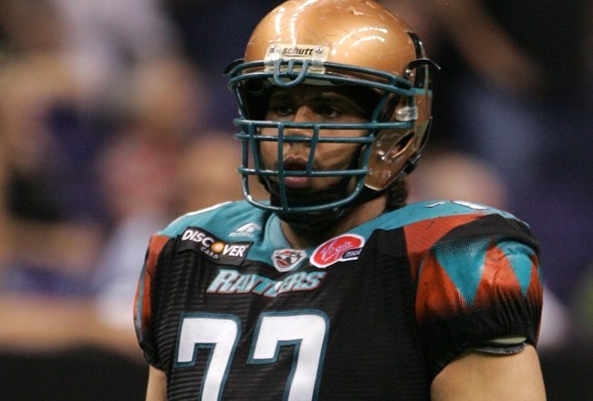 PHOENIX - JUNE 30:  Defensive lineman Anttaj Hawthorne #77 waits between plays during a game against the Grand Rapids Rampage at the US Airways Center in Phoenix, Arizona on June 30, 2008.  (Photo by Gene Lower/Getty Images)