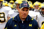 SOUTH BEND, IN - SEPTEMBER 11: Head coach Rich Rodriguez of the Michigan Wolverines waits with his team before entering the field for a game against the Notre Dame Fighting Irish at Notre Dame Stadium on September 11, 2010 in South Bend, Indiana. Michigan defeated Notre Dame 28-24. (Photo by Jonathan Daniel/Getty Images)
