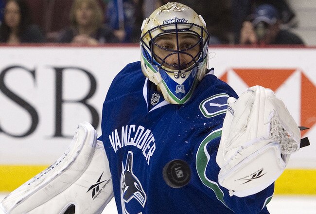 VANCOUVER, CANADA - MARCH 3: Goalie Roberto Luongo #1 of the Vancouver Canucks makes a glove save against the Nashville Predators during the first period in NHL action on March 03, 2011 at Rogers Arena in Vancouver, British Columbia, Canada.  (Photo by Rich Lam/Getty Images)