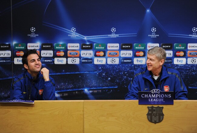 BARCELONA, SPAIN - MARCH 07:  Arsene Wenger (R), Manager of Arsenal sits besides player Cesc Fabregas during a press conference ahead of their UEFA Champions League round of 16 second leg match against Barcelona at the Camp Nou stadium on March 7, 2011 in Barcelona, Spain.  (Photo by Jasper Juinen/Getty Images)