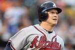 NEW YORK - SEPTEMBER 18:  Nate McLouth #24 of the Atlanta Braves rounds the bases after hitting a home run against  the New York Mets in the ninth inning of their game on September 18, 2010 at Citi Field in the Flushing neighborhood of the Queens borough of New York City.  (Photo by Al Bello/Getty Images)