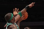 NEW YORK, NY - APRIL 22:  Amar'e Stoudemire #1 of the New York Knicks loses the ball as he drives against Jermaine O'Neal #7 of the Boston Celtics in Game Three of the Eastern Conference Quarterfinals in the 2011 NBA Playoffs on April 22, 2011 at Madison Square Garden in New York City.  NOTE TO USER: User expressly acknowledges and agrees that, by downloading and or using this photograph, User is consenting to the terms and conditions of the Getty Images License Agreement.  (Photo by Nick Laham/Getty Images)