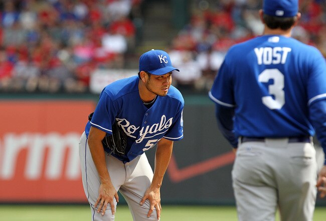 ARLINGTON, TX - APRIL 24:  Pitcher Bruce Chen #52 of the Kansas City Royals is taken out of the game by manager, Ned Yost #3 against the Texas Rangers in the 6th inning at Rangers Ballpark in Arlington on April 24, 2011 in Arlington, Texas.  (Photo by Ronald Martinez/Getty Images)