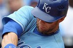 KANSAS CITY, MO - APRIL 17:  Alex Gordon #4 of the Kansas City Royals connects during the game against the Seattle Mariners on April 17, 2011 at Kauffman Stadium in Kansas City, Missouri.  (Photo by Jamie Squire/Getty Images)