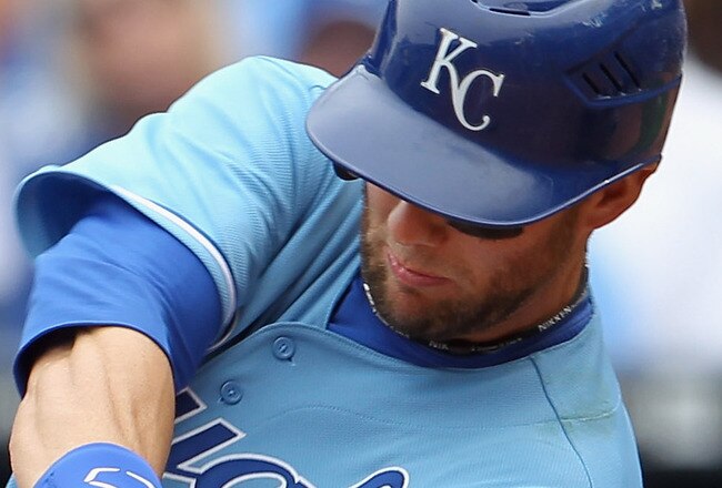 KANSAS CITY, MO - APRIL 17:  Alex Gordon #4 of the Kansas City Royals connects during the game against the Seattle Mariners on April 17, 2011 at Kauffman Stadium in Kansas City, Missouri.  (Photo by Jamie Squire/Getty Images)