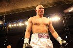 ATLANTIC CITY, NJ - MARCH 26: Tommy Zbikowski walks to his corner during his Heavyweight bout against Caleb Grummet during Top Rank's 'Featherweight Fury' on March 26, 2011 at Boardwalk Hall in Atlantic City, New Jersey. (Photo by Hunter Martin/Getty Images)