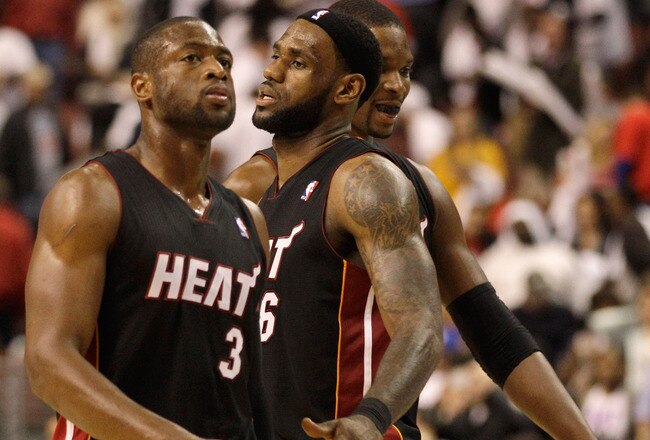 PHILADELPHIA, PA - APRIL 21: Dwyane Wade #3 of the Miami Heat and teammate LeBron James #6 (R) against the Philadelphia 76ers during the second half of game three of the Eastern Conference Quarterfinals at Wells Fargo Center on April 21, 2011 in Philadelphia, Pennsylvania.NOTE TO USER: User expressly acknowledges and agrees that, by downloading and/or using this Photograph, User is consenting to the terms and conditions of the Getty Images License Agreement.  (Photo by Rob Carr/Getty Images)