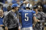 DETROIT, MI - DECEMBER 12:  Drew Stanton #5 of the Detroit Lions is congragulated by Matthew Stafford #9 and Shaun Hill #14 after a fourth quarter touchdown against the Green Bay Packers on December 12, 2010 at Ford Field in Detroit, Michigan. Detroit won the game 7-3. (Photo by Gregory Shamus/Getty Images)