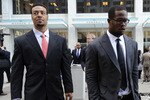 SAINT PAUL, MN - APRIL 6: Wide receiver Vincent Jackson (L) of the San Diego Chargers and linebacker Von Miller of Texas A&M, who is entered in this year's NFL draft, leave following a hearing at the U.S. Courthouse on April 6, 2011 in Saint Paul, Minnesota. NFL players have filed an antitrust lawsuit against the NFL owners after labor talks between the two broke down last month. (Photo by Hannah Foslien/Getty Images)