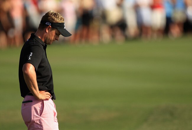 HILTON HEAD ISLAND, SC - APRIL 24:  Luke Donald of England waits to hit his shot from the and on the 18th hole during the final round of The Heritage at Harbour Town Golf Links on April 24, 2011 in Hilton Head Island, South Carolina.  (Photo by Streeter Lecka/Getty Images)