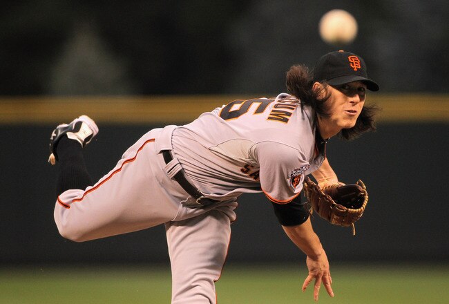 DENVER, CO - APRIL 18:  Starting pitcher Tim Lincecum #55 of the San Francisco Giants delivers against the Colorado Rockies at Coors Field on April 18, 2011 in Denver, Colorado.  (Photo by Doug Pensinger/Getty Images)