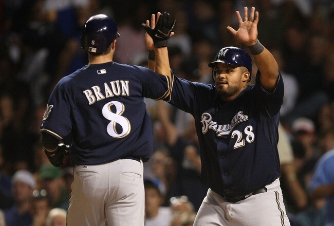 CHICAGO - AUGUST 29: Prince Fielder #28 of the Milwaukee Brewers greets teammate Ryan Braun #8 after Braun scored a run in the 7th inning against the Chicago Cubs on August 29, 2007 at Wrigley Field in Chicago, Illinois. (Photo by Jonathan Daniel/Getty Images)