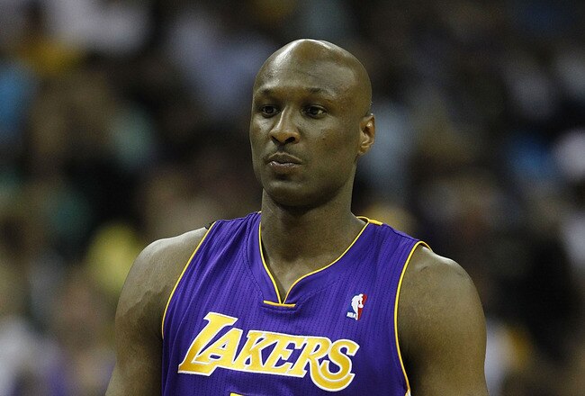 NEW ORLEANS, LA - APRIL 24:  Lamar Odom #7 of the Los Angeles Lakers stands during a freethrow against the New Orleans Hornets in Game Four of the Western Conference Quarterfinals in the 2011 NBA Playoffs at New Orleans Arena on April 24, 2011 in New Orleans, Louisiana. NOTE TO USER: User expressly acknowledges and agrees that, by downloading and or using this Photograph, user is consenting to the terms and conditions of the Getty Images License Agreement.  (Photo by Jeff Zelevansky/Getty Images)