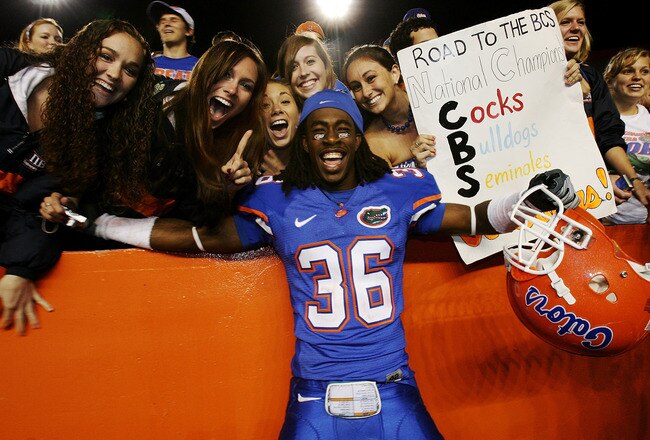 GAINESVILLE, FL - NOVEMBER 15:  Cornerback Moses Jenkins #36 of the Florida Gators celebrates with fans after defeating the South Carolina Gamecocks at Ben Hill Griffin Stadium on November 15, 2008 in Gainesville, Florida. Florida defeated South Carolina 56-6.  (Photo by Doug Benc/Getty Images)