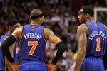 MIAMI, FL - FEBRUARY 27:  Carmelo Anthony #7 and Amar'e Stoudemire #1 of the New York Knicks talk during a game against the the Miami Heat at American Airlines Arena on February 27, 2011 in Miami, Florida. NOTE TO USER: User expressly acknowledges and agrees that, by downloading and/or using this Photograph, User is consenting to the terms and conditions of the Getty Images License Agreement.  (Photo by Mike Ehrmann/Getty Images)