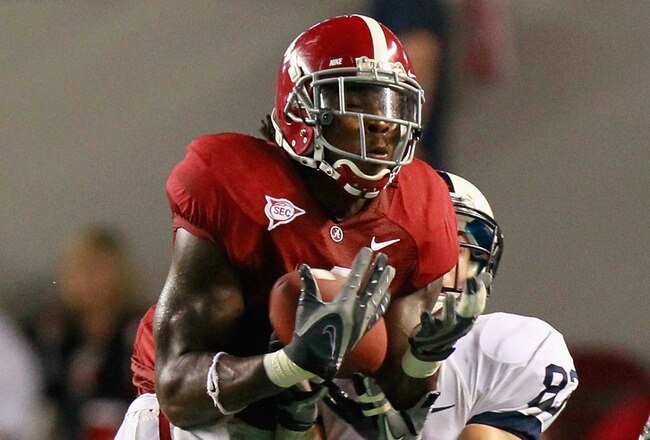 TUSCALOOSA, AL - SEPTEMBER 11:  Mark Barron #4 of the Alabama Crimson Tide intercepts a pass intended for Brett Brackett #83 of the Penn State Nittany Lions at Bryant-Denny Stadium on September 11, 2010 in Tuscaloosa, Alabama.  (Photo by Kevin C. Cox/Getty Images)