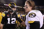 TEMPE, AZ - DECEMBER 28:  Quarterback Ricky Stanzi #12 of the Iowa Hawkeyes greets Blaine Gabbert #11 of the Missouri Tigers following the Insight Bowl at Sun Devil Stadium on December 28, 2010 in Tempe, Arizona. The Hawkeyes defeated the Tigers 27-24.  (Photo by Christian Petersen/Getty Images)
