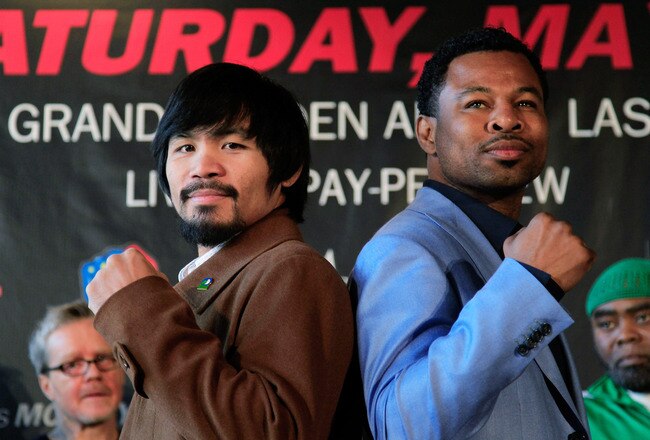NEW YORK, NY - FEBRUARY 14:  (L) Manny Pacquiao and (R) Shane Mosley pose to promote their upcoming fight at The Lighthouse at Chelsea Piers on February 14, 2011 in New York City.  (Photo by Chris Trotman/Getty Images)