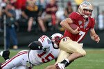 ORLANDO, FL - DECEMBER 27:  Christian Ponder #7 of the Florida State Seminoles breaks the tackle of Culmer St. Jean #15 of the Wisconsin Badgers during the Champs Bowl on December 27, 2008 at the Citrus Bowl in Orlando, Florida.  (Photo by Sam Greenwood/Getty Images)