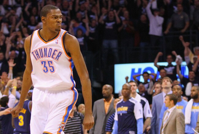 OKLAHOMA CITY, OK - APRIL 27: Kevin Durant #35 of the Oklahoma City Thunder looks to the bench after hitting a key three-point shot against the Denver Nuggets in Game Five of the Western Conference Quarterfinals in the 2011 NBA Playoffs on April 27, 2011 at the Ford Center in Oklahoma City, Oklahoma. NOTE TO USER: User expressly acknowledges and agrees that, by downloading and or using this photograph, User is consenting to the terms and conditions of the Getty Images License Agreement. (Photo by Dilip Vishwanat/Getty Images)